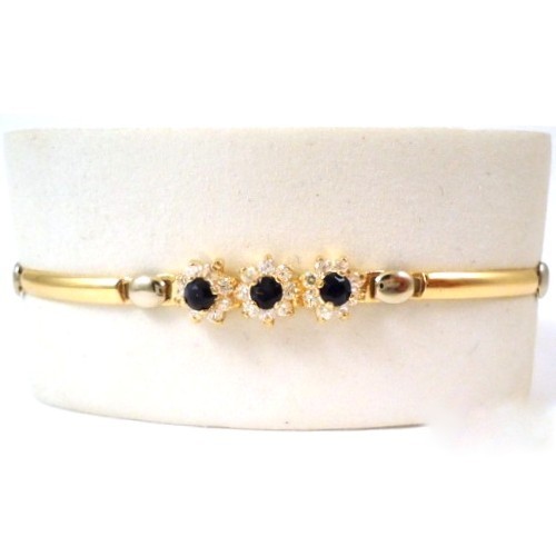 BRACCIALE DA DONNA FIORE IN ORO GIALLO 18 KT CON ZIRCONI E ONICE