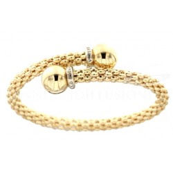 BRACCIALE DA DONNA RIGIDO A BACIO IN ORO GIALLO E BIANCO 18 KT