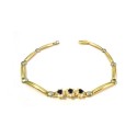 BRACCIALE DA DONNA FIORE IN ORO GIALLO 18 KT CON ZIRCONI E ONICE