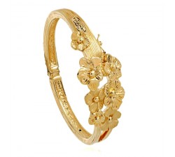 BRACCIALE RIGIDO DA DONNA IN ORO GIALLO 18 KT CON FIORI