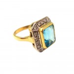 ANILLO en oro de 18 KT blanco con Esmeralda y Circonita