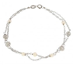 BRACCIALE DA DONNA IN ORO GIALLO 18 KT CON SFERE E ZIRCONI