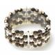 BRACCIALE KIARA PERLE BIANCHE CON SFERE KRISTAL COLOR BRONZO